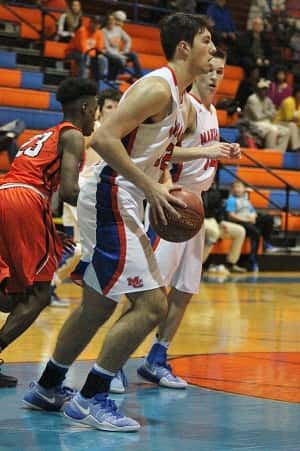 Matt French grabbed this rebound against Hopkinsville, one of seven he had in the game.