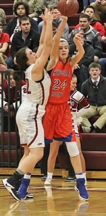 Lorin Powell (24) guarded by McCracken County's Sarah Adams, scored 11 points in the Lady Marshals win.
