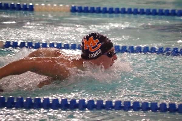 Coleton Jones during the 50 yard butterfly event.