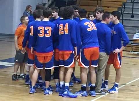 The Marshals huddle up before their game against Arnold in the Marlin Christmas Classic.