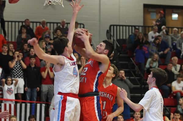 Marshall County's Matthew French worked inside against Calloway County and led the Marshals with nine points.