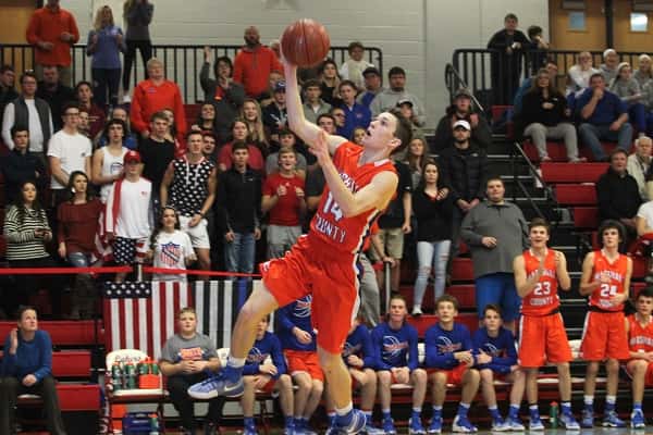 Lucas Nichols sailing to the goal following a steal in the Marshals district win over Calloway County last week.