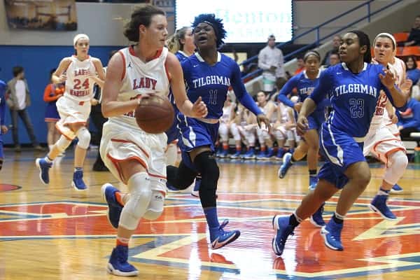 Hannah Langhi with the ball for the Lady Marshals, led the team with 30 points and 15 rebounds in their 72-11 win over Paducah Tilghman.