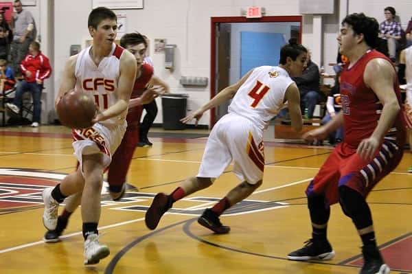 Elijah Toth driving in for a lay up against CCA on January 9th.