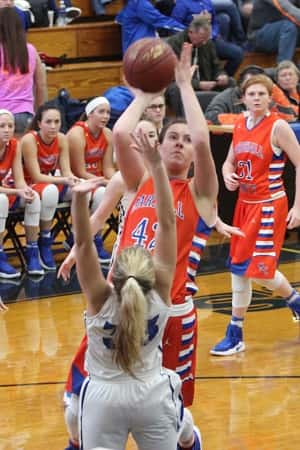 Hannah Langhi, shooting over Lady Eagle Lyndi Qualls, led the Lady Marshals with 15 points.