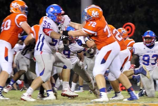 Cameron (72) against Christian County this season, had 59 tackles for the Marshals.