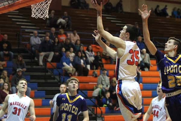 Aaron Reed floating up to the basket for two of his 18 points in the Marshals win over Lyon County.