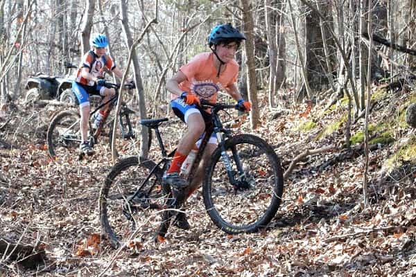 Marshall County team members Carson Denfip and Landon Utley (background) cruise through the half-pipe section of the trail. 