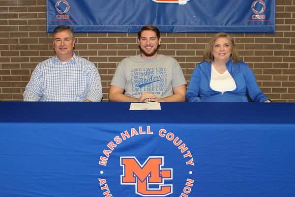 Cameron Thurman joined by his parents Tim and Laura at his signing with Lindsey Wilson College.