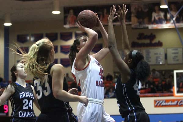 Hannah Langhi shoots over Graves County's Zippora Johnson on her way to a 28 point game in the Lady Marshals win over the Lady Eagles.