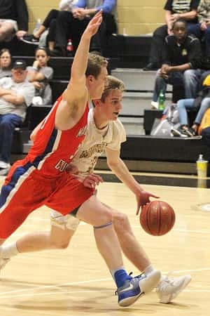 Dylan Walters guarding Murray's Preston English, helped hold the senior guard to eight second half points.
