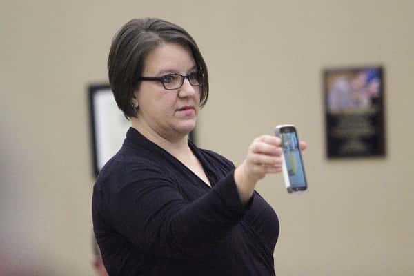 Heather Adams who lives in the Harvey community of Marshall County showed members of the Fiscal Court what her water looked like on Tuesday morning before she came to the courthouse.