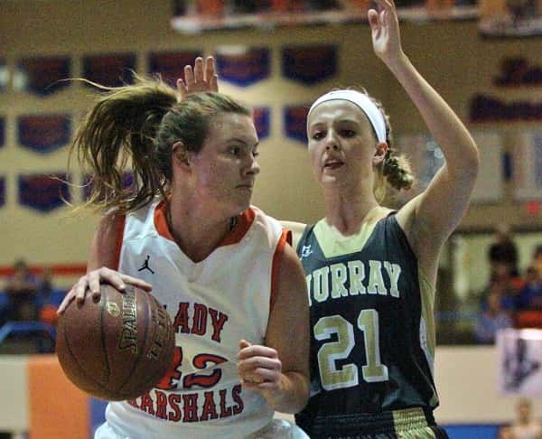 Hannah Langhi, guarded by Murray's Maddie Waldrop, in Thursday's 4th District Championship.