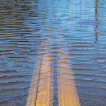 closeup-of-high-water-flooding-on-neighborhood-street