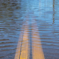 closeup-of-high-water-flooding-on-neighborhood-street