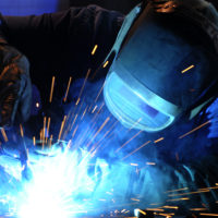 worker-while-doing-a-welding-with-arc-welder