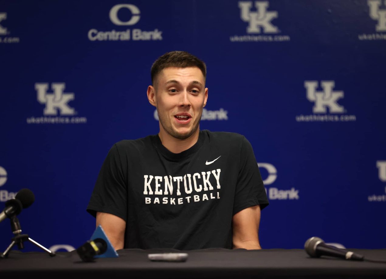 University of Kentucky forward Josh Harrellson is congratulated by a  News Photo - Getty Images