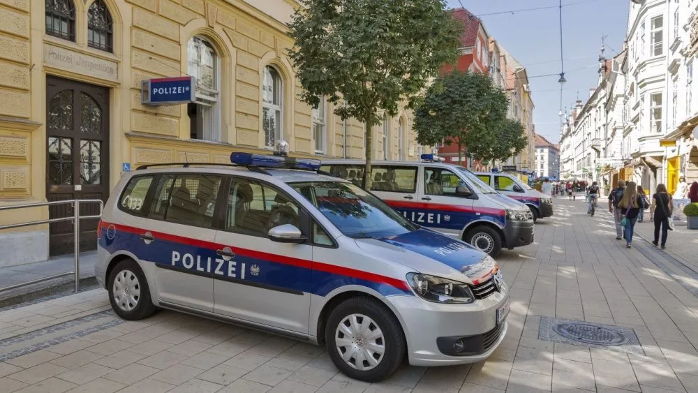 Schmiedgasse street and local police station in Graz Old Town. Graz is the capital of Styria and second largest city in Austria. GRAZ^ AUSTRIA - SEPTEMBER 11^ 2015