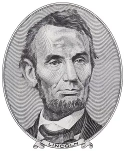 president-abraham-lincoln-on-us-five-dollar-bill-macro-isolated-united-states-money-closeup
