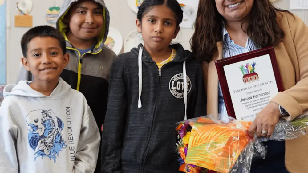 teacher and students for teacher of the month march 2025