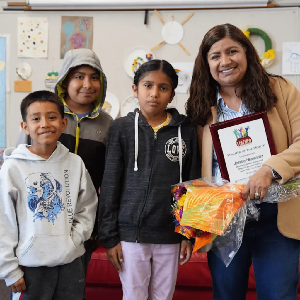 teacher and students for teacher of the month march 2025