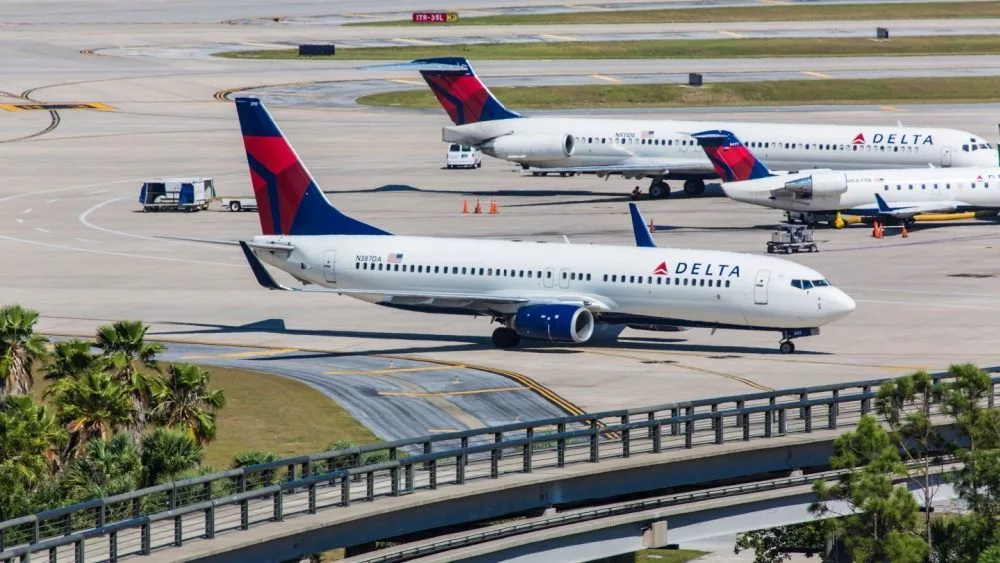 Boeing 737 and 757 Delta parked on Orlando International Airport on September 4^ 2012
