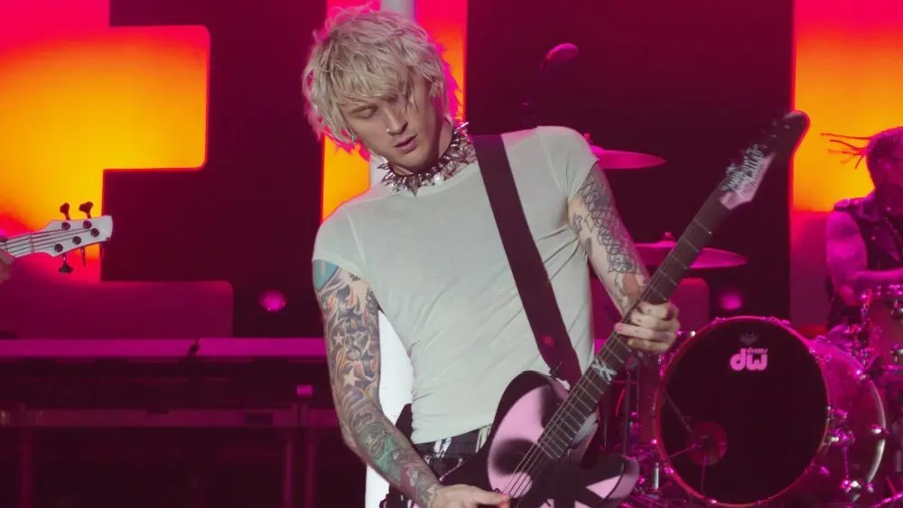 Machine Gun Kelly performs on stage at the Audacy Beach Festival. FORT LAUDERDALE^ FLORIDA - DECEMBER 4^ 2022