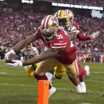 APTOPIX NFC Championship Packers 49ers Football: San Francisco 49ers running back Raheem Mostert (31) scores in front of Green Bay Packers free safety Darnell Savage during the first half of the NFL NFC Championship football game Sunday, Jan. 19, 2020, in Santa Clara, Calif. (AP Photo/Tony Avelar)
