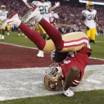NFC Championship Packers 49ers Football: San Francisco 49ers running back Raheem Mostert (31) scores against the Green Bay Packers during the first half of the NFL NFC Championship football game Sunday, Jan. 19, 2020, in Santa Clara, Calif. (AP Photo/Tony Avelar)