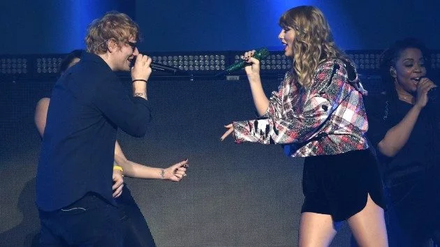 getty_taylorandedonstage_020622