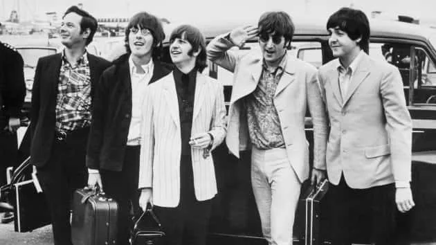 getty_brianepsteinwiththebeatles630_070220