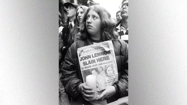 getty_johnlennonfanmourns_110722