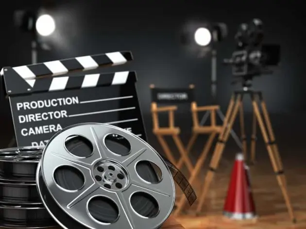 video-movie-cinema-concept-retro-camera-reels-clapperboard