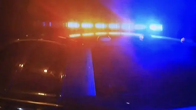 police-car-fast-moving-with-bright-flashing-lights-2