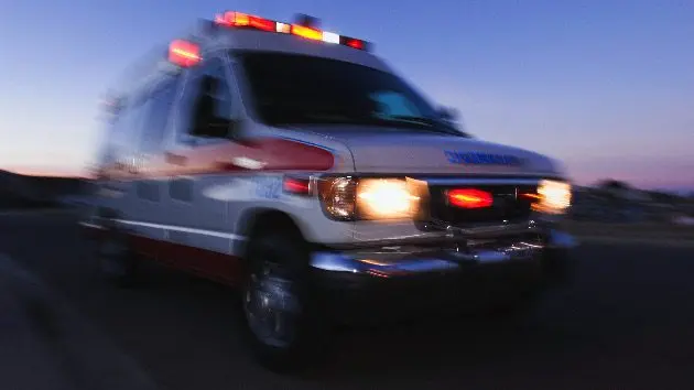 blurred-view-of-ambulance-driving-at-dusk