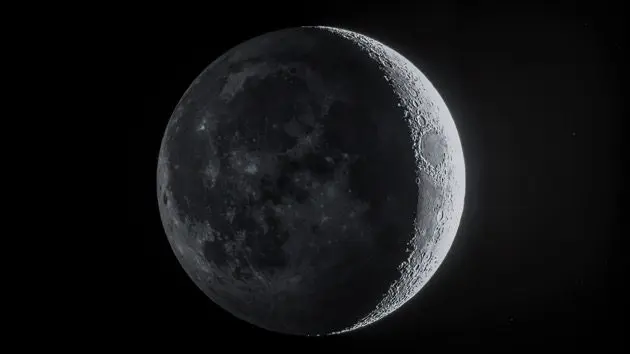 low-angle-view-of-moon-against-sky-at-night