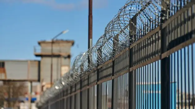 barbed-wire-on-fence-steel-grating-fence-metal-fence-wire-private-area-protection-safety