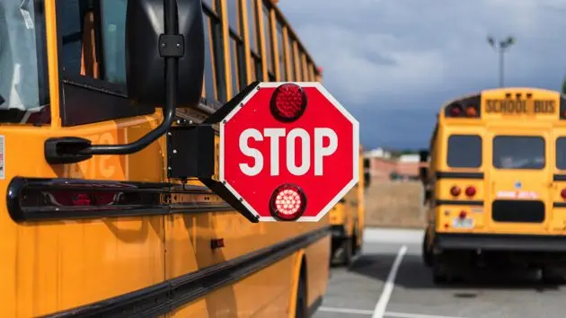 school-bus-driver-doing-safety-check