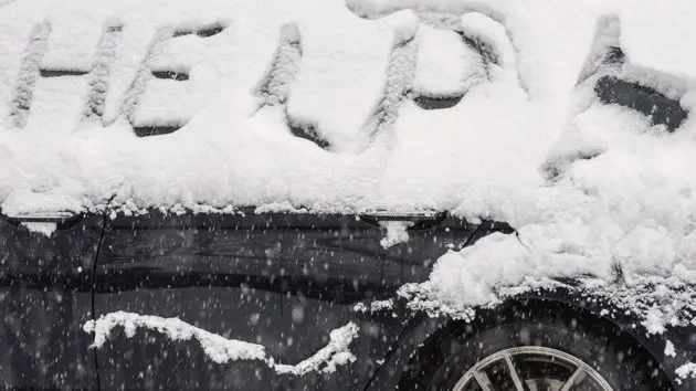 help-written-on-snowed-in-car