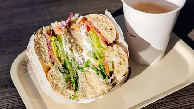 close-up-of-bagel-with-salmon-and-cream-cheese-and-coffee