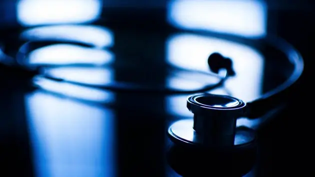 a-doctors-stethoscope-on-a-glass-table