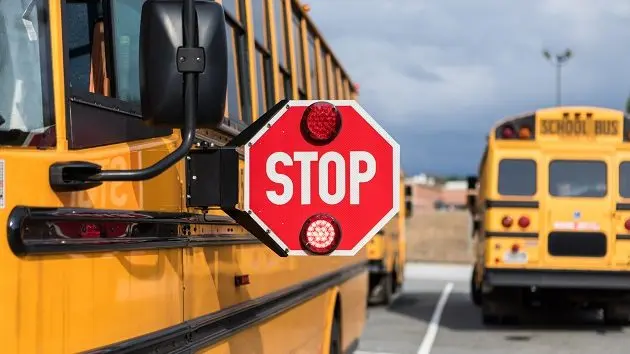 school-bus-driver-doing-safety-check-2