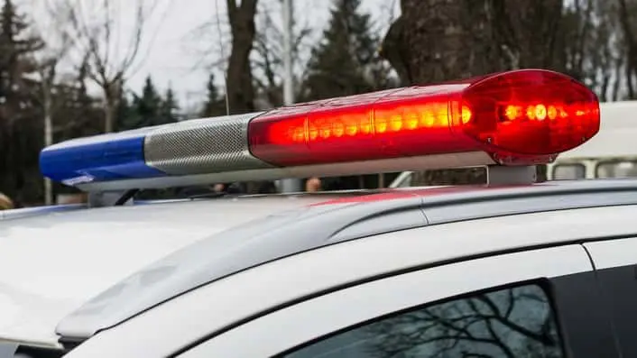 red-and-blue-lights-of-police-car-in-day-time-patrolling-the-city-crime-scene-selective-focus