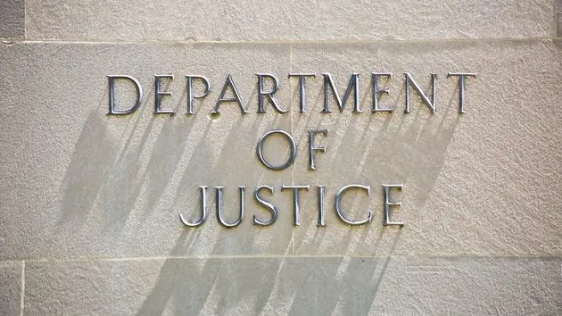building-entrance-sign-for-the-department-of-justice-in-washington-dc