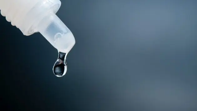 close-up-of-liquid-dropping-from-pipette-2