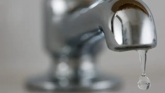 water-drips-from-domestic-tap-uk