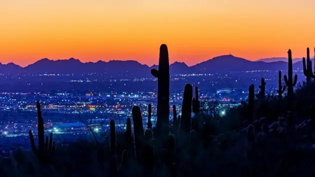 panoramic-view-of-cityscape-against-sky-during-sunset