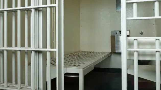 open-door-to-prison-cell-2