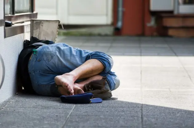 homeless-sleeping-man-e1605886602284