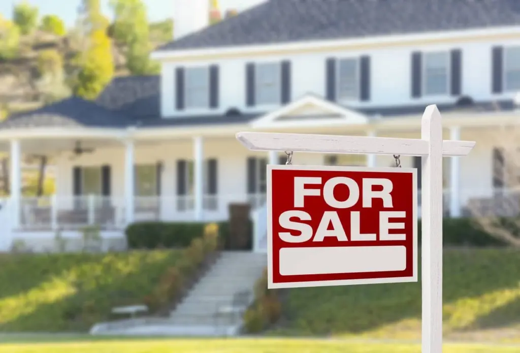 home-for-sale-sign-in-front-of-new-house